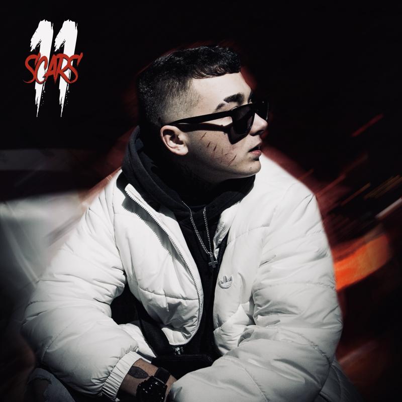 AMK představuje svůj druhý sólový projekt 11 Scars o jizvách ze své minulosti. Zároveň vydává videoklip k pokračování tracku BRZO RÁNO